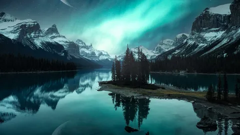 Aurora over Spirit Island on Maligne Lake, Jasper National Park, Alberta, Canada